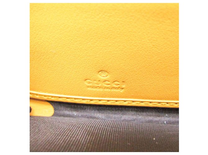 Cartera larga de cuero amarillo con estampado GG de Gucci - vista 10