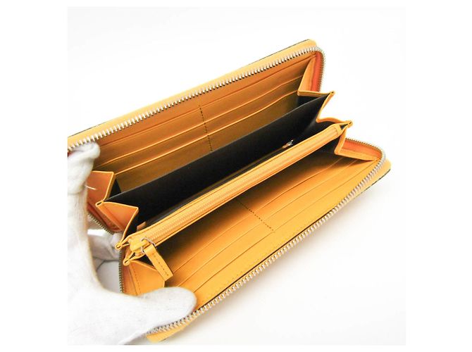 Cartera larga de cuero amarillo con estampado GG de Gucci - vista 3