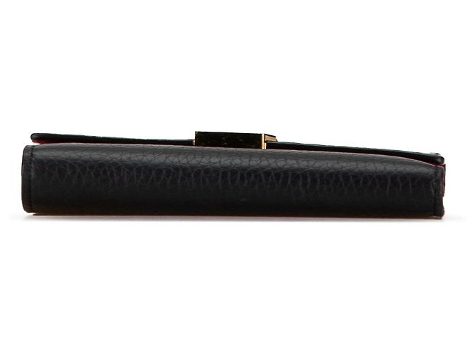 Billetera compacta Capucines en taurillon negro Louis Vuitton - vista 4