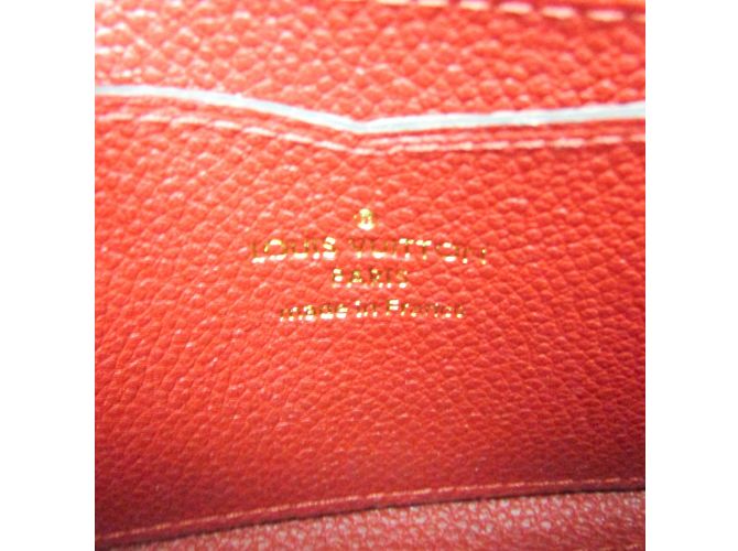 Monedero Zippy en Monogram Empreinte de Louis Vuitton Roja - vista 10