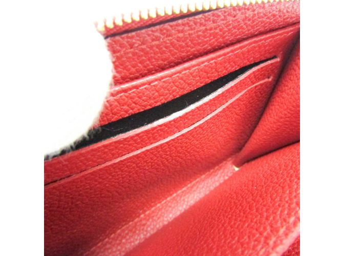 Monedero Zippy en Monogram Empreinte de Louis Vuitton Roja - vista 8