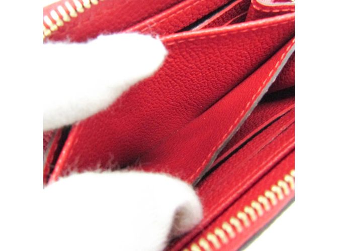 Monedero Zippy en Monogram Empreinte de Louis Vuitton Roja - vista 9