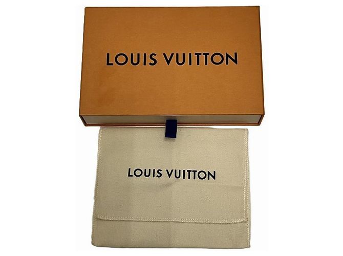 Cartera tri-fold Capucines XS Louis Vuitton - vista 6