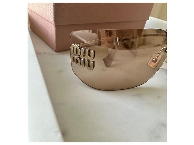 Occhiali da sole Miu Miu marrone chiaro plastica - vista 3