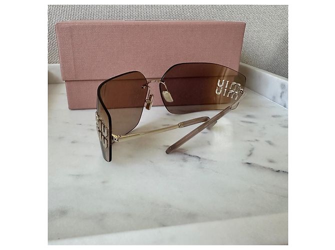 Occhiali da sole Miu Miu marrone chiaro plastica - vista 4