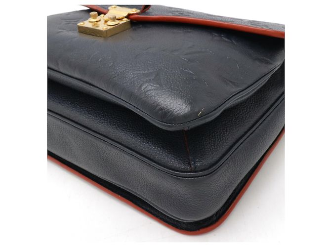 Borsa Pochette Metis MM in Monogram Empreinte Louis Vuitton Rosso - vista 4