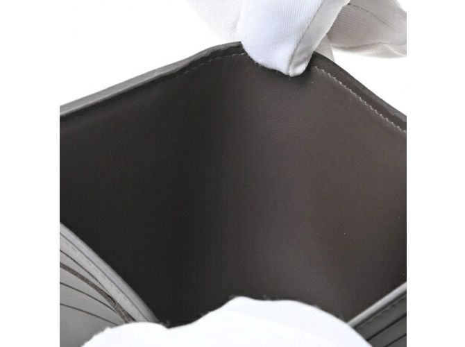 Portefeuille compact tri-fold Capucines de Louis Vuitton - vue 8
