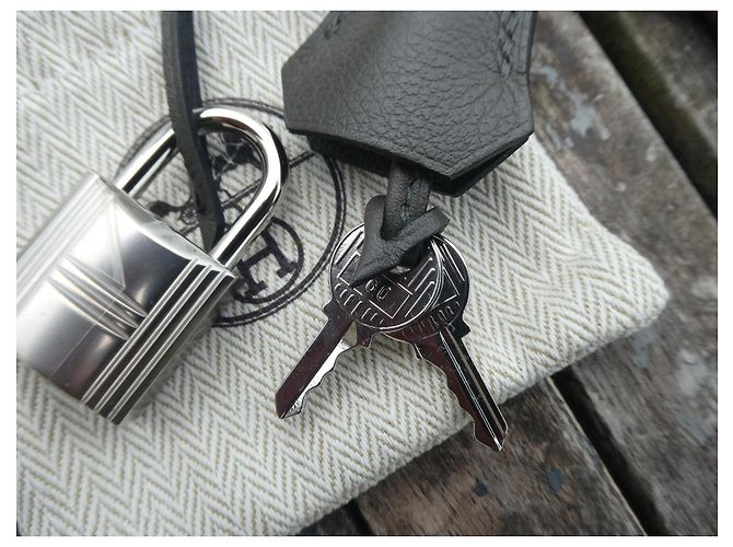 campanella, linguetta e lucchetto hermès nuovo per borsa hermès kelly messenger dustbag Cachi - vista 7