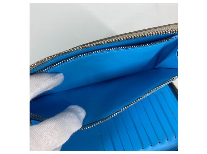 Louis Vuitton Taurillon Climbing Zippy Wallet Blue Beige - view 11