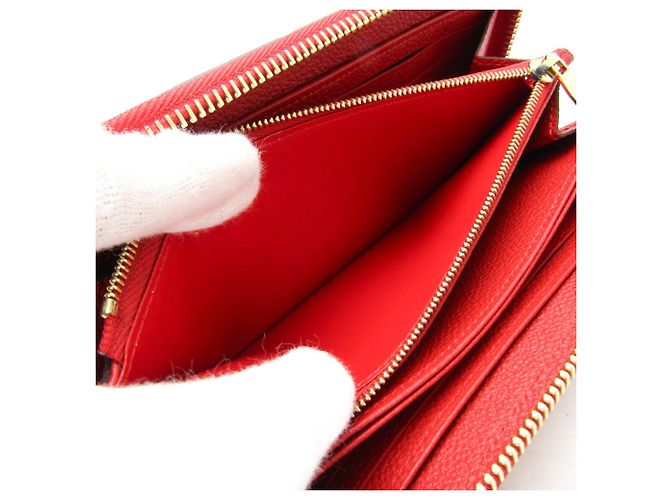 Cartera Zippy Monogram Empreinte Louis Vuitton Roja - vista 8