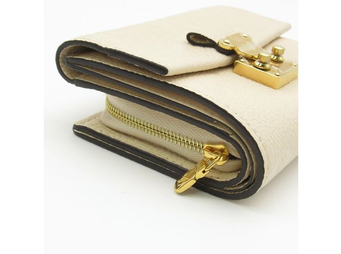Cartera Metis Compact Tri-fold de Louis Vuitton Beige - vista 7