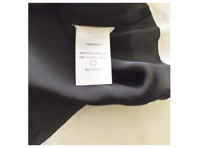 Autre Marque Blouse Olivia Palermo en soie noire et ivoire à manches volantes - vue 4