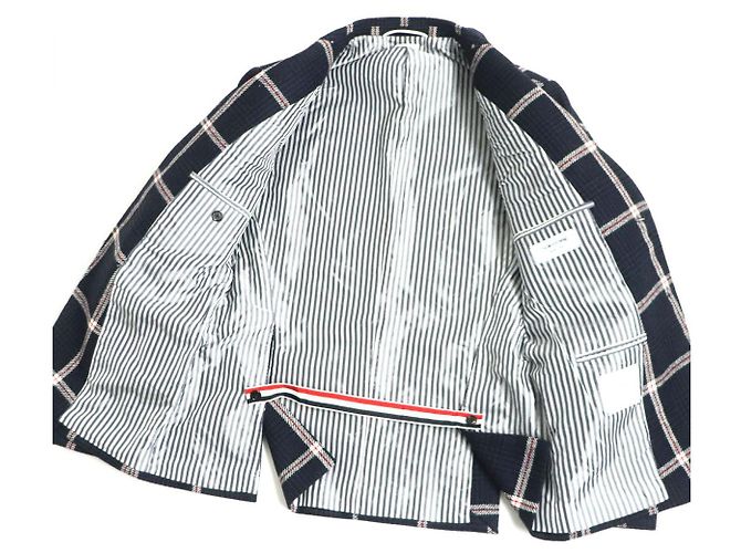 Completo in tweed a quadri Thom Browne con bottoni dorati e maniche lunghe - vista 4
