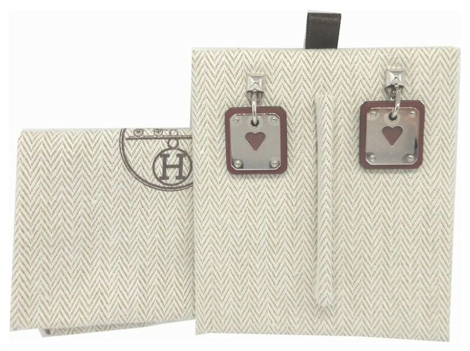 Hermès Orecchini in metallo con cuore inciso in pelle Hermes Asdukur Z Marrone Argento - vista 3