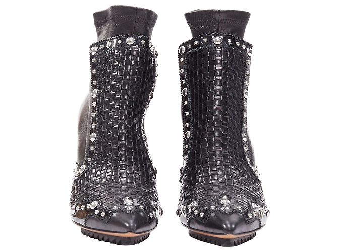 Botines puntiagudos de cuero trenzado con tachuelas plateadas de la línea Iron de Givenchy - vista 3