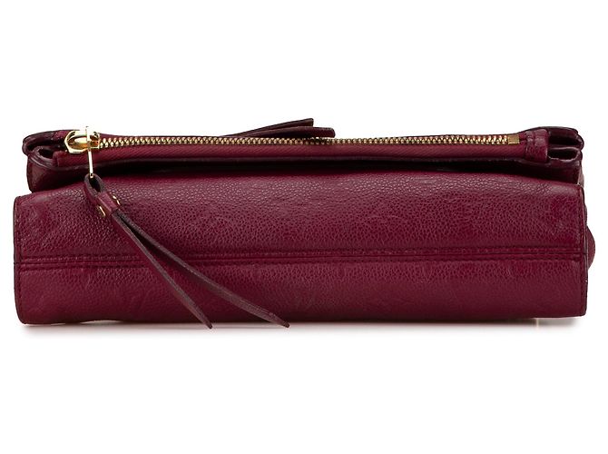 Clutch Petillante in Monogram Empreinte Rosso Louis Vuitton - vista 3