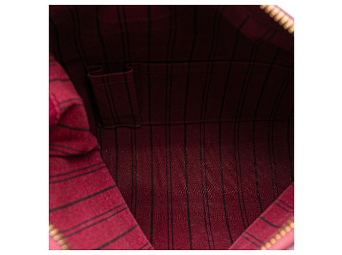 Clutch Petillante in Monogram Empreinte Rosso Louis Vuitton - vista 4