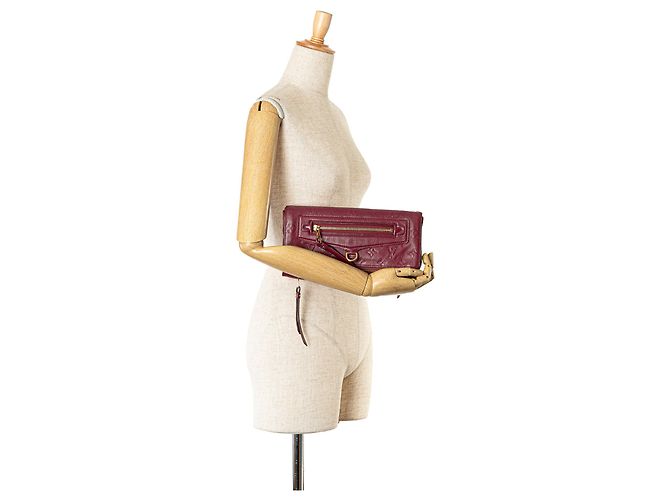 Clutch Petillante in Monogram Empreinte Rosso Louis Vuitton - vista 9