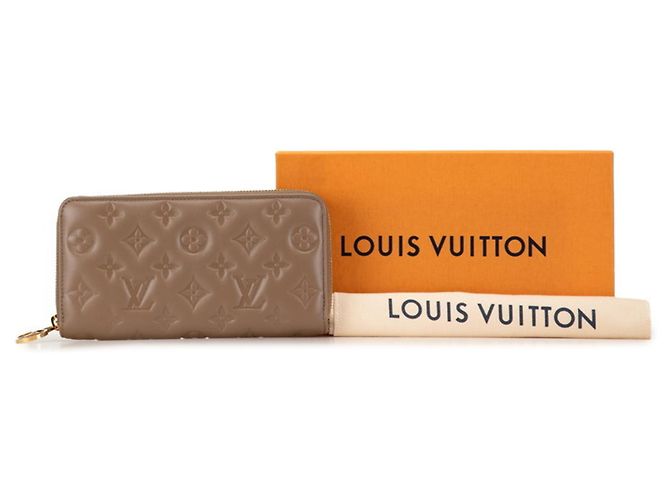 Louis Vuitton Monogram Embossed Zippy Wallet Beige Taupe - view 7