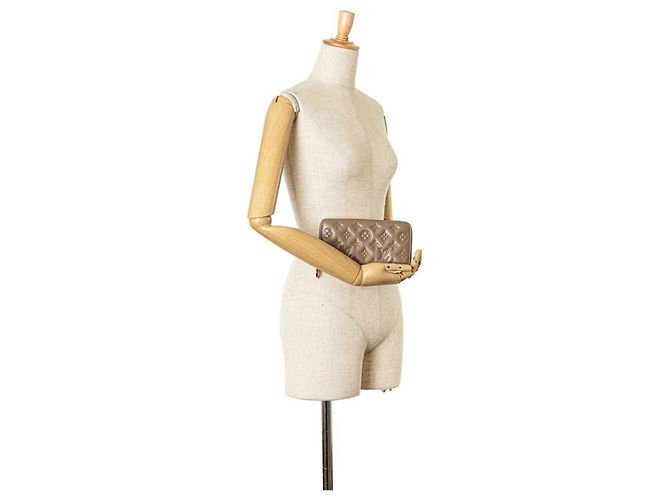 Louis Vuitton Monogram Embossed Zippy Wallet Beige Taupe - view 8
