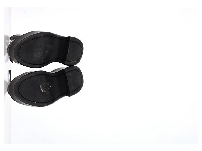 As botas ankle chunky com zíper frontal em couro preto da The Row - vista 12