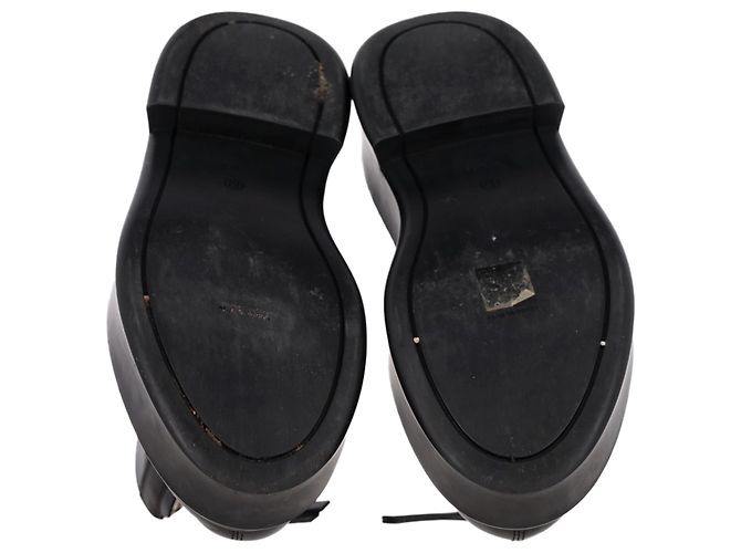 As botas ankle chunky com zíper frontal em couro preto da The Row - vista 6