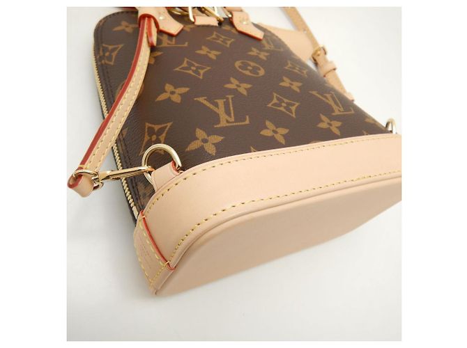 Zaino Alma Monogram Louis Vuitton M47132 Marrone - vista 5