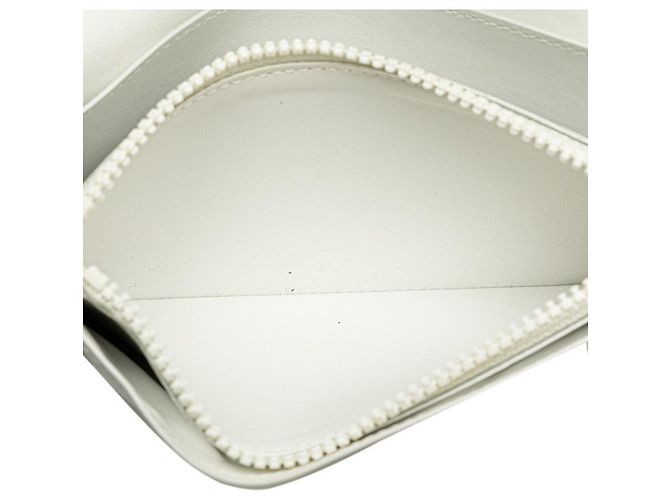 Portafoglio lungo Brazza NM Monogram Empreinte di Louis Vuitton Bianco - vista 5