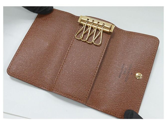 Portachiavi 4 chiavi Monogram Louis Vuitton M62631 - vista 3