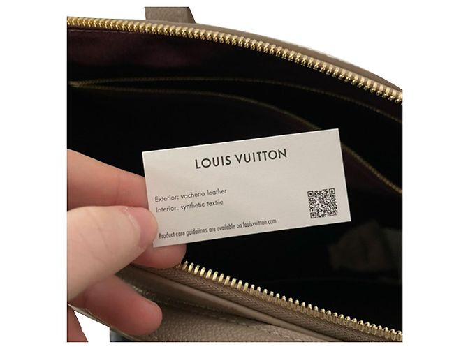 Borsa da viaggio in pelle Empreinte beige con monogramma in rilievo Louis Vuitton - vista 5