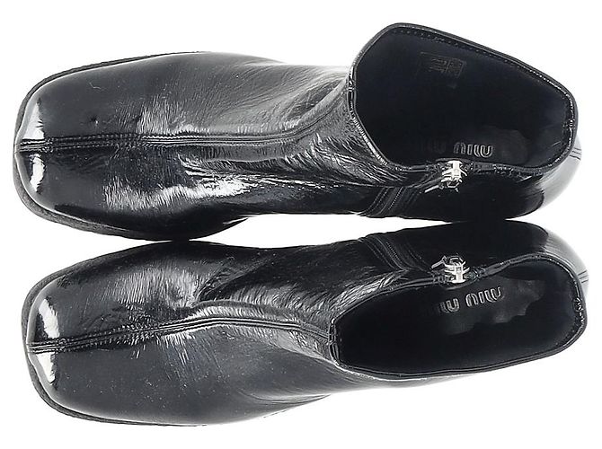 Miu Miu Stretch-Plattformstiefel aus schwarzem Naplak-Leder - Ansicht 9