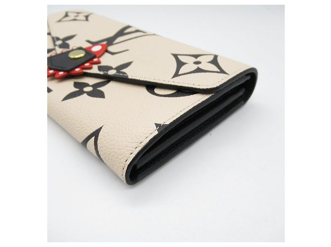 Portefeuille Sarah Louis Vuitton Beige M69514 - vue 9