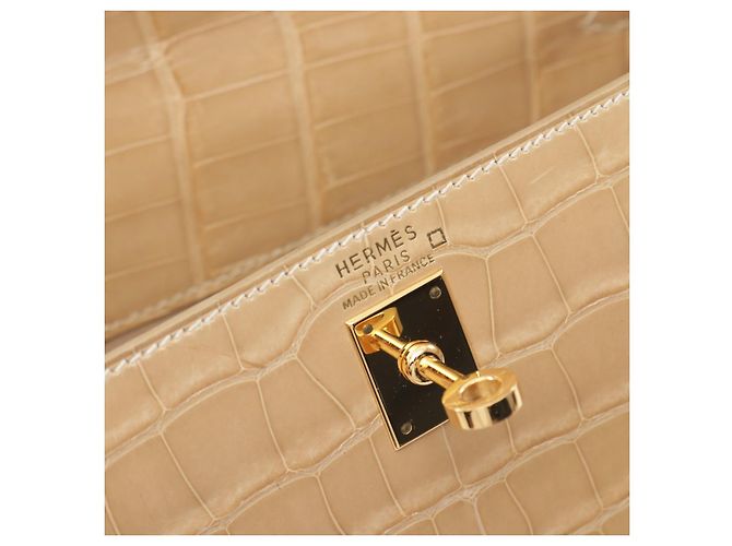 Sac à main Hermès Kelly 25 en alligator beige - vue 4