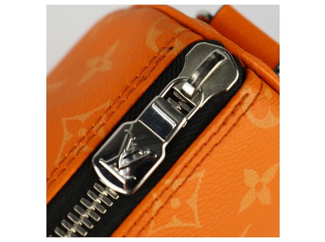 Borsa Louis Vuitton Keepall Bandouliere 25 Taigarama Arancione - vista 7