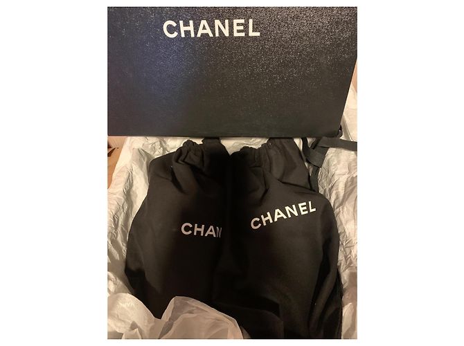 Scarpe basse Chanel in pelle d'agnello nero bianco - vista 4