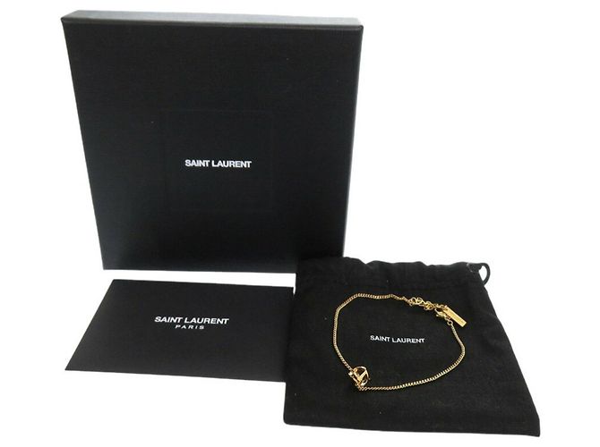 Pulsera Cassandra Monogram Twist Opium Yves Saint Laurent Dorado - vista 3