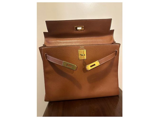 Borsa Hermès Kelly 28 in pelle color caramello - vista 7