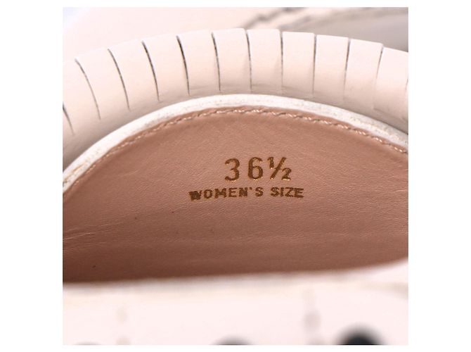 Mocassini Tod's con dettagli a nappina e catena in pelle bianca Bianco - vista 14