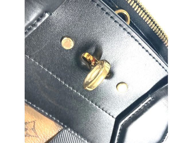 Borsa City Steamer PM Monogramma Reverse Louis Vuitton Marrone Nero - vista 13
