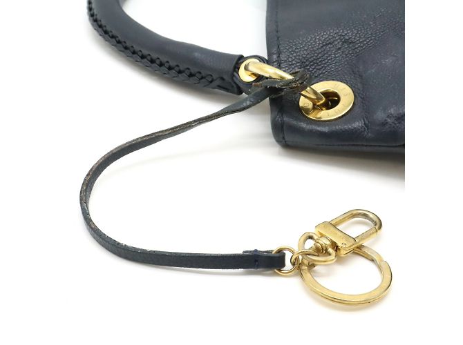 Borsa Tote Artsy MM in Monogram Empreinte Louis Vuitton Blu navy - vista 9