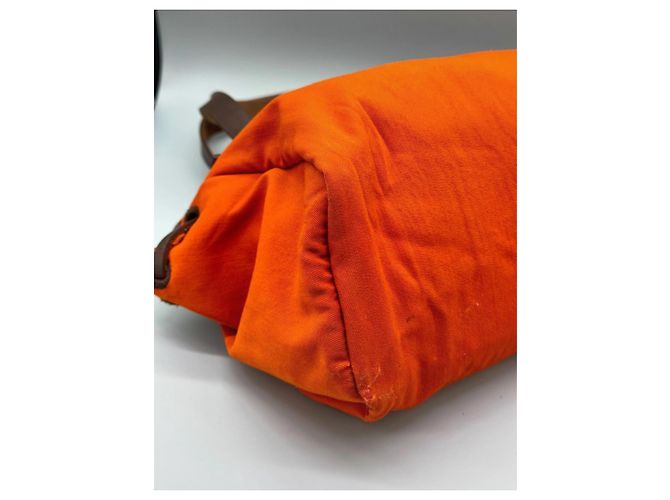 Hermès La sua borsa a spalla in pelle e tela arancione Marrone - vista 14