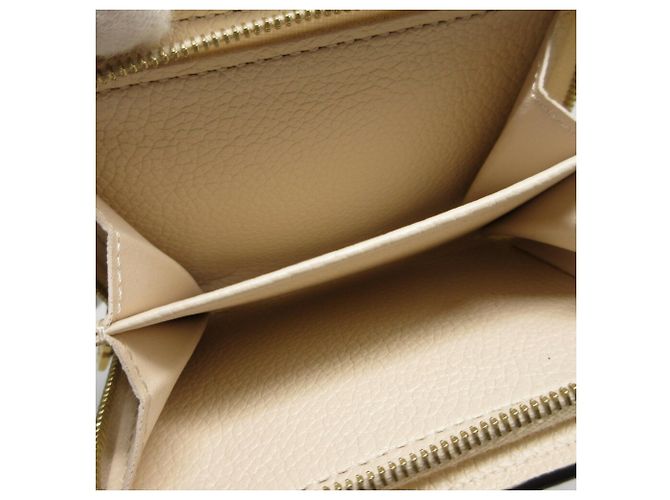 Cartera Tri-Fold Monogram Empreinte Louis Vuitton Crudo - vista 5