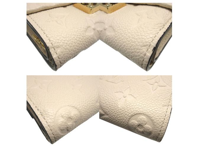 Cartera Tri-Fold Monogram Empreinte Louis Vuitton Crudo - vista 8