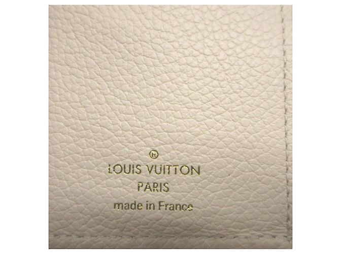 Cartera Tri-Fold Monogram Empreinte Louis Vuitton Crudo - vista 9