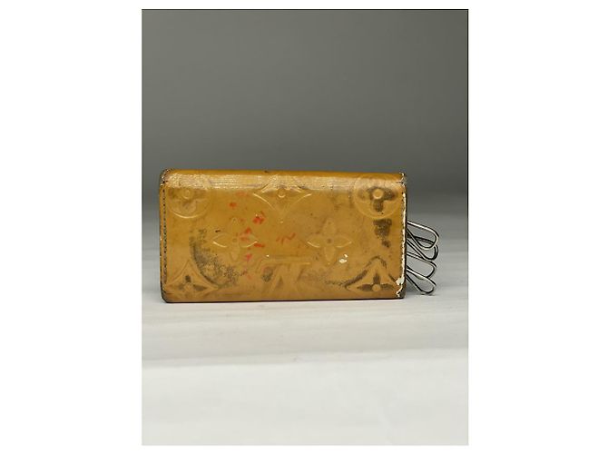 Porte-monnaie en cuir jaune Lockme de Louis Vuitton - vue 3