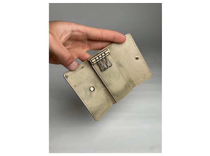 Porte-monnaie en cuir jaune Lockme de Louis Vuitton - vue 5