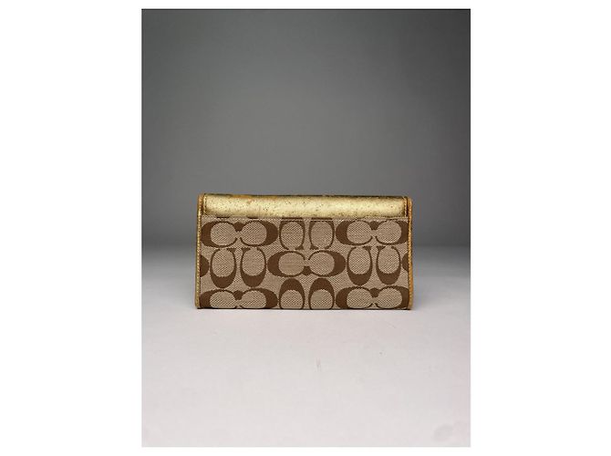 Billetera de cuero dorado Coach - vista 2