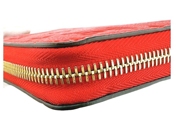 Cartera Larga Monogram Empreinte Louis Vuitton Roja - vista 6