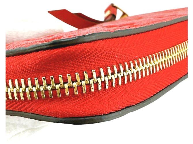 Cartera Larga Monogram Empreinte Louis Vuitton Roja - vista 7