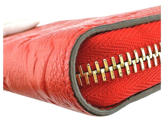 Cartera Larga Monogram Empreinte Louis Vuitton Roja - vista 8